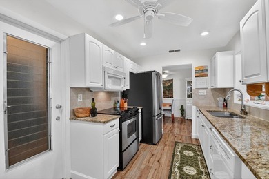 Pristine, turnkey (furniture optional) single-level CBS home on Leisureville Community Golf Course in Florida - for sale on GolfHomes.com, golf home, golf lot