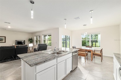 Light flows gracefully through every room of this elegant on Lake Diamond Golf and Country Club in Florida - for sale on GolfHomes.com, golf home, golf lot