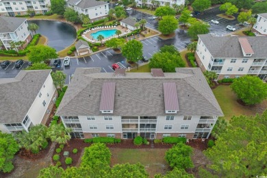 Discover this beautifully maintained top-floor condo nestled in on Barefoot Resort and Golf Club  in South Carolina - for sale on GolfHomes.com, golf home, golf lot