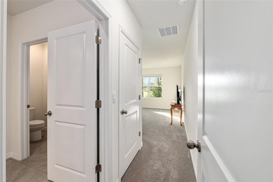 Light flows gracefully through every room of this elegant on Lake Diamond Golf and Country Club in Florida - for sale on GolfHomes.com, golf home, golf lot