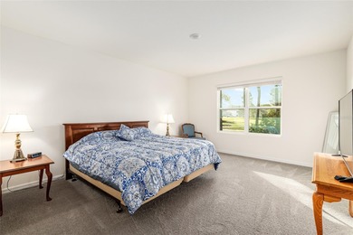 Light flows gracefully through every room of this elegant on Lake Diamond Golf and Country Club in Florida - for sale on GolfHomes.com, golf home, golf lot