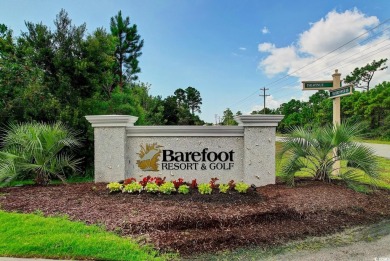 Discover this beautifully maintained top-floor condo nestled in on Barefoot Resort and Golf Club  in South Carolina - for sale on GolfHomes.com, golf home, golf lot