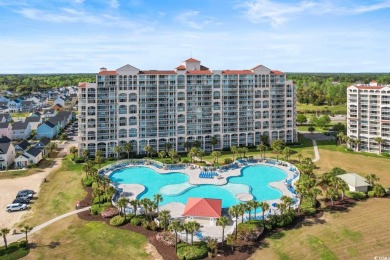 Discover this beautifully maintained top-floor condo nestled in on Barefoot Resort and Golf Club  in South Carolina - for sale on GolfHomes.com, golf home, golf lot