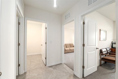 Light flows gracefully through every room of this elegant on Lake Diamond Golf and Country Club in Florida - for sale on GolfHomes.com, golf home, golf lot