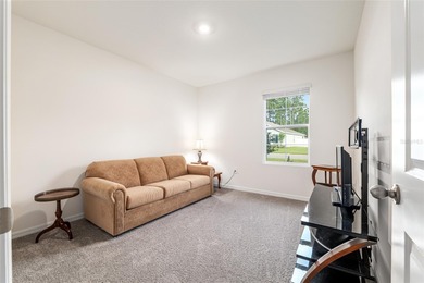 Light flows gracefully through every room of this elegant on Lake Diamond Golf and Country Club in Florida - for sale on GolfHomes.com, golf home, golf lot