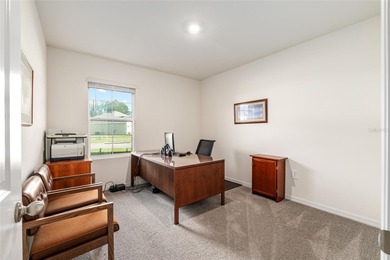 Light flows gracefully through every room of this elegant on Lake Diamond Golf and Country Club in Florida - for sale on GolfHomes.com, golf home, golf lot