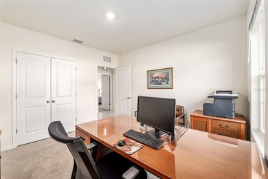 Light flows gracefully through every room of this elegant on Lake Diamond Golf and Country Club in Florida - for sale on GolfHomes.com, golf home, golf lot