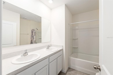 Light flows gracefully through every room of this elegant on Lake Diamond Golf and Country Club in Florida - for sale on GolfHomes.com, golf home, golf lot