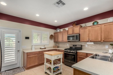 This beautifully maintained 3-bedroom, 2-bath home with a 2.5 on Poston Butte Golf Club in Arizona - for sale on GolfHomes.com, golf home, golf lot