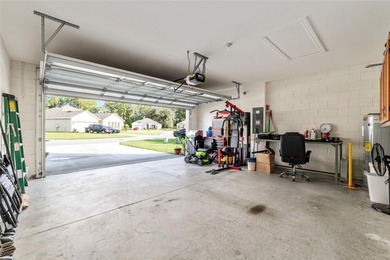 Light flows gracefully through every room of this elegant on Lake Diamond Golf and Country Club in Florida - for sale on GolfHomes.com, golf home, golf lot
