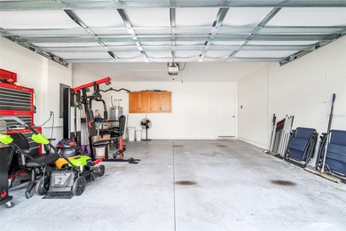 Light flows gracefully through every room of this elegant on Lake Diamond Golf and Country Club in Florida - for sale on GolfHomes.com, golf home, golf lot