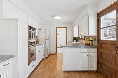 Welcome to 8108 W Franklin Avenue - a bright, welcoming home in on Minneapolis Golf Club in Minnesota - for sale on GolfHomes.com, golf home, golf lot