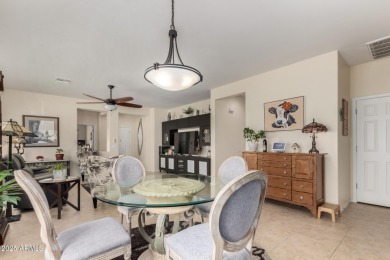 This beautifully maintained 3-bedroom, 2-bath home with a 2.5 on Poston Butte Golf Club in Arizona - for sale on GolfHomes.com, golf home, golf lot