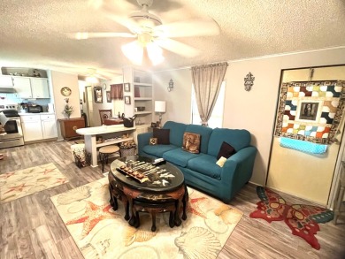 Discover the epitome of comfort and style in the premier 55+ on Lily Lake Golf and RV Resort in Florida - for sale on GolfHomes.com, golf home, golf lot