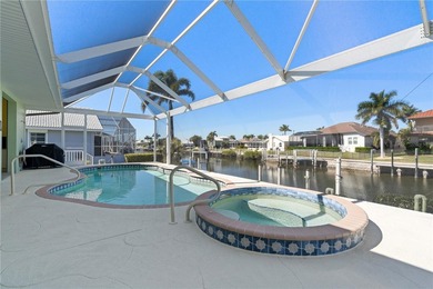 SAILBOAT-ACCESS WATERFRONT HOME IN PUNTA GORDA ISLES - Located on Saint Andrews South Golf Club in Florida - for sale on GolfHomes.com, golf home, golf lot