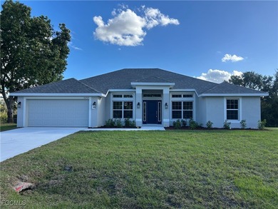 THIS BEAUTIFUL BRAND NEW ADAMS HOME IS MOVE IN READY AND WAITING on Kingsway Country Club in Florida - for sale on GolfHomes.com, golf home, golf lot