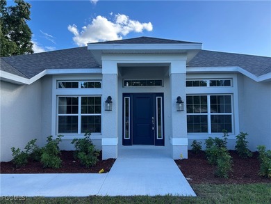 THIS BEAUTIFUL BRAND NEW ADAMS HOME IS MOVE IN READY AND WAITING on Kingsway Country Club in Florida - for sale on GolfHomes.com, golf home, golf lot