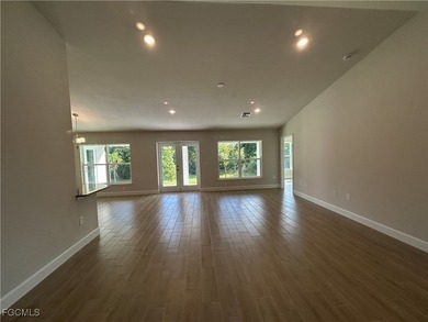 THIS BEAUTIFUL BRAND NEW ADAMS HOME IS MOVE IN READY AND WAITING on Kingsway Country Club in Florida - for sale on GolfHomes.com, golf home, golf lot