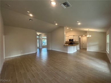 THIS BEAUTIFUL BRAND NEW ADAMS HOME IS MOVE IN READY AND WAITING on Kingsway Country Club in Florida - for sale on GolfHomes.com, golf home, golf lot