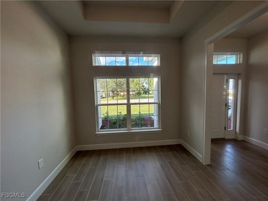 THIS BEAUTIFUL BRAND NEW ADAMS HOME IS MOVE IN READY AND WAITING on Kingsway Country Club in Florida - for sale on GolfHomes.com, golf home, golf lot