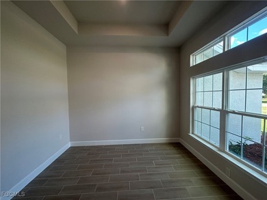 THIS BEAUTIFUL BRAND NEW ADAMS HOME IS MOVE IN READY AND WAITING on Kingsway Country Club in Florida - for sale on GolfHomes.com, golf home, golf lot