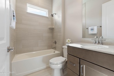 Why wait for new construction? This like-new move-in ready 2022 on Conservatory Course At Hammock Beach Resort in Florida - for sale on GolfHomes.com, golf home, golf lot