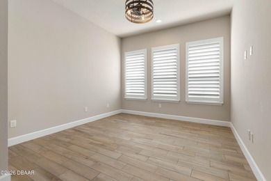 Why wait for new construction? This like-new move-in ready 2022 on Conservatory Course At Hammock Beach Resort in Florida - for sale on GolfHomes.com, golf home, golf lot