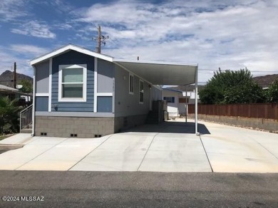 Like new 2020 fully furnished Cavco home with many extras! Home on Tucson Estates Golf Course in Arizona - for sale on GolfHomes.com, golf home, golf lot