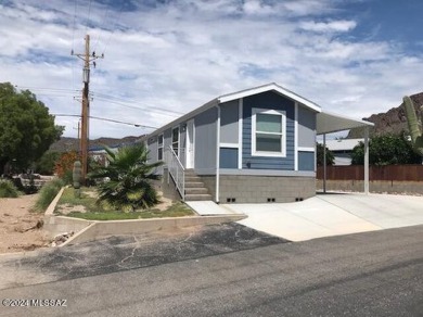 Like new 2020 fully furnished Cavco home with many extras! Home on Tucson Estates Golf Course in Arizona - for sale on GolfHomes.com, golf home, golf lot