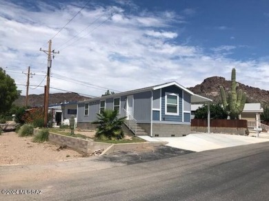 Like new 2020 fully furnished Cavco home with many extras! Home on Tucson Estates Golf Course in Arizona - for sale on GolfHomes.com, golf home, golf lot