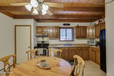 Welcome to your year-round retreat in The Hideout! This spacious on The Hideout Golf in Pennsylvania - for sale on GolfHomes.com, golf home, golf lot
