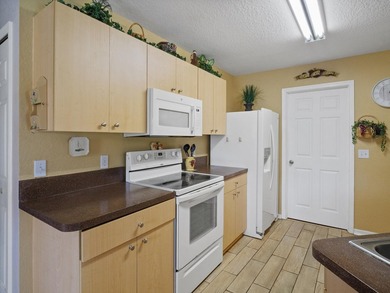 Welcome to this beautifully maintained CBS home located in a on Spanish Lakes Golf Village in Florida - for sale on GolfHomes.com, golf home, golf lot