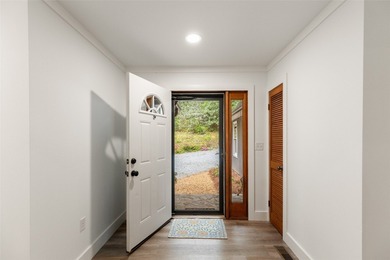 Tucked behind the gates of the Country Club of Sapphire Valley on The Country Club of Sapphire Valley in North Carolina - for sale on GolfHomes.com, golf home, golf lot