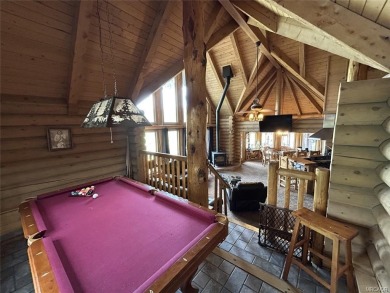 Beautiful 3-bedroom, 2-bath true full log cabin located directly on Big Bear Mountain Ski and Golf Resort in California - for sale on GolfHomes.com, golf home, golf lot