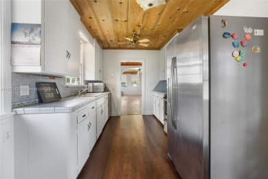 Charming 1920's 3 Bedroom Bungalow in sought after historic on West Palm Beach Golf Course in Florida - for sale on GolfHomes.com, golf home, golf lot