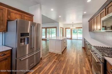 Stunning custom-built home located in the beautiful Star Valley on Star Valley RV Golf Course in Wyoming - for sale on GolfHomes.com, golf home, golf lot