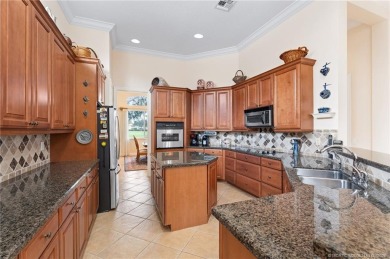 Welcome to courtyard living at its finest! This beautiful pool on  in Florida - for sale on GolfHomes.com, golf home, golf lot