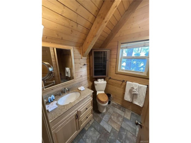 Beautiful 3-bedroom, 2-bath true full log cabin located directly on Big Bear Mountain Ski and Golf Resort in California - for sale on GolfHomes.com, golf home, golf lot