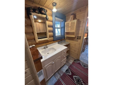 Beautiful 3-bedroom, 2-bath true full log cabin located directly on Big Bear Mountain Ski and Golf Resort in California - for sale on GolfHomes.com, golf home, golf lot