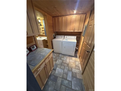 Beautiful 3-bedroom, 2-bath true full log cabin located directly on Big Bear Mountain Ski and Golf Resort in California - for sale on GolfHomes.com, golf home, golf lot