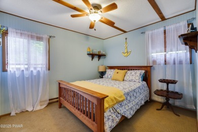 Welcome to your year-round retreat in The Hideout! This spacious on The Hideout Golf in Pennsylvania - for sale on GolfHomes.com, golf home, golf lot
