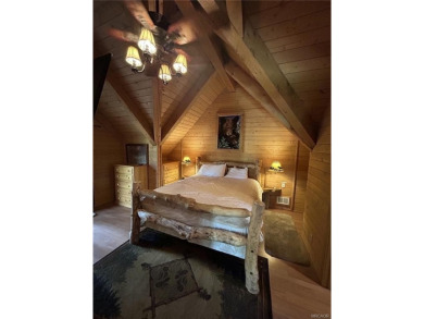 Beautiful 3-bedroom, 2-bath true full log cabin located directly on Big Bear Mountain Ski and Golf Resort in California - for sale on GolfHomes.com, golf home, golf lot