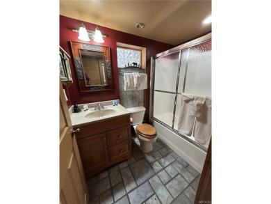 Beautiful 3-bedroom, 2-bath true full log cabin located directly on Big Bear Mountain Ski and Golf Resort in California - for sale on GolfHomes.com, golf home, golf lot