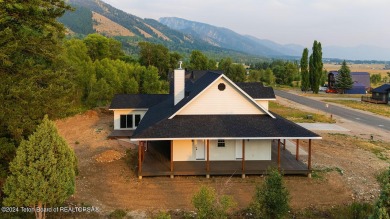 Stunning custom-built home located in the beautiful Star Valley on Star Valley RV Golf Course in Wyoming - for sale on GolfHomes.com, golf home, golf lot