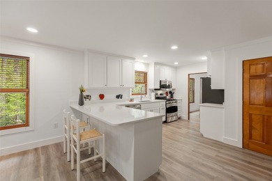 Tucked behind the gates of the Country Club of Sapphire Valley on The Country Club of Sapphire Valley in North Carolina - for sale on GolfHomes.com, golf home, golf lot