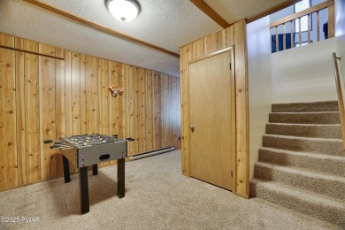 Welcome to your year-round retreat in The Hideout! This spacious on The Hideout Golf in Pennsylvania - for sale on GolfHomes.com, golf home, golf lot