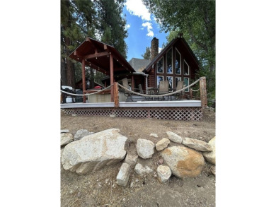 Beautiful 3-bedroom, 2-bath true full log cabin located directly on Big Bear Mountain Ski and Golf Resort in California - for sale on GolfHomes.com, golf home, golf lot