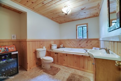 Welcome to your year-round retreat in The Hideout! This spacious on The Hideout Golf in Pennsylvania - for sale on GolfHomes.com, golf home, golf lot