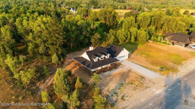 Stunning custom-built home located in the beautiful Star Valley on Star Valley RV Golf Course in Wyoming - for sale on GolfHomes.com, golf home, golf lot