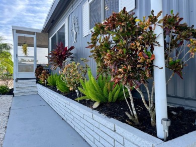 Welcome to your dream home in a picturesque setting located at on Bird Bay Executive Golf Club in Florida - for sale on GolfHomes.com, golf home, golf lot
